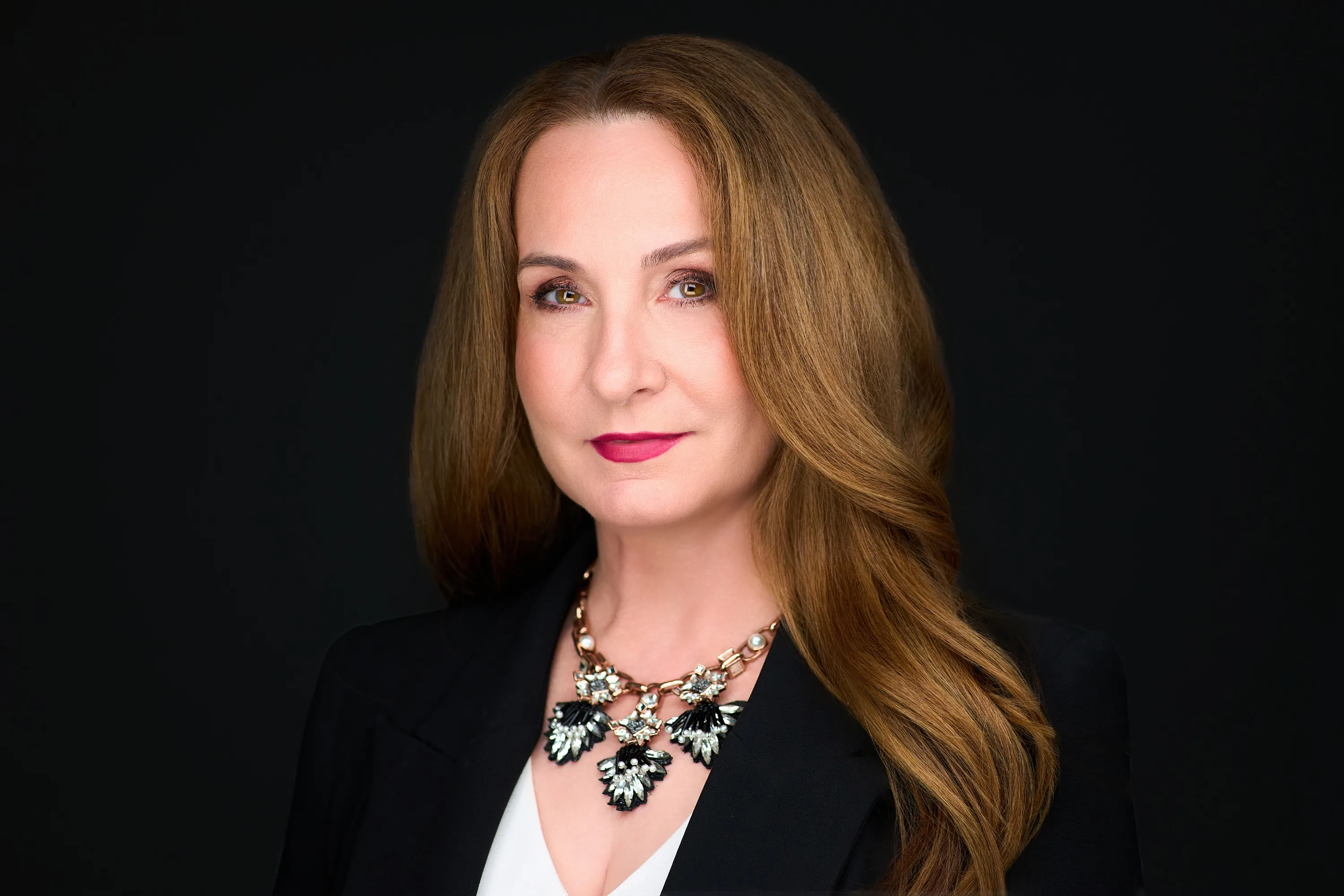 Creative professional LinkedIn headshot example in studio lighting